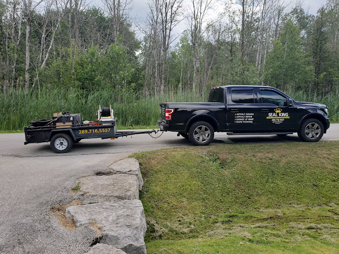 64981 asphalt seal king snowplowing